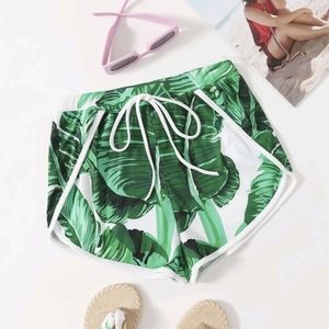 Tropical print dolphin shorts
